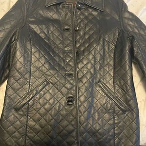 100% black quilted, leather women’s jacket